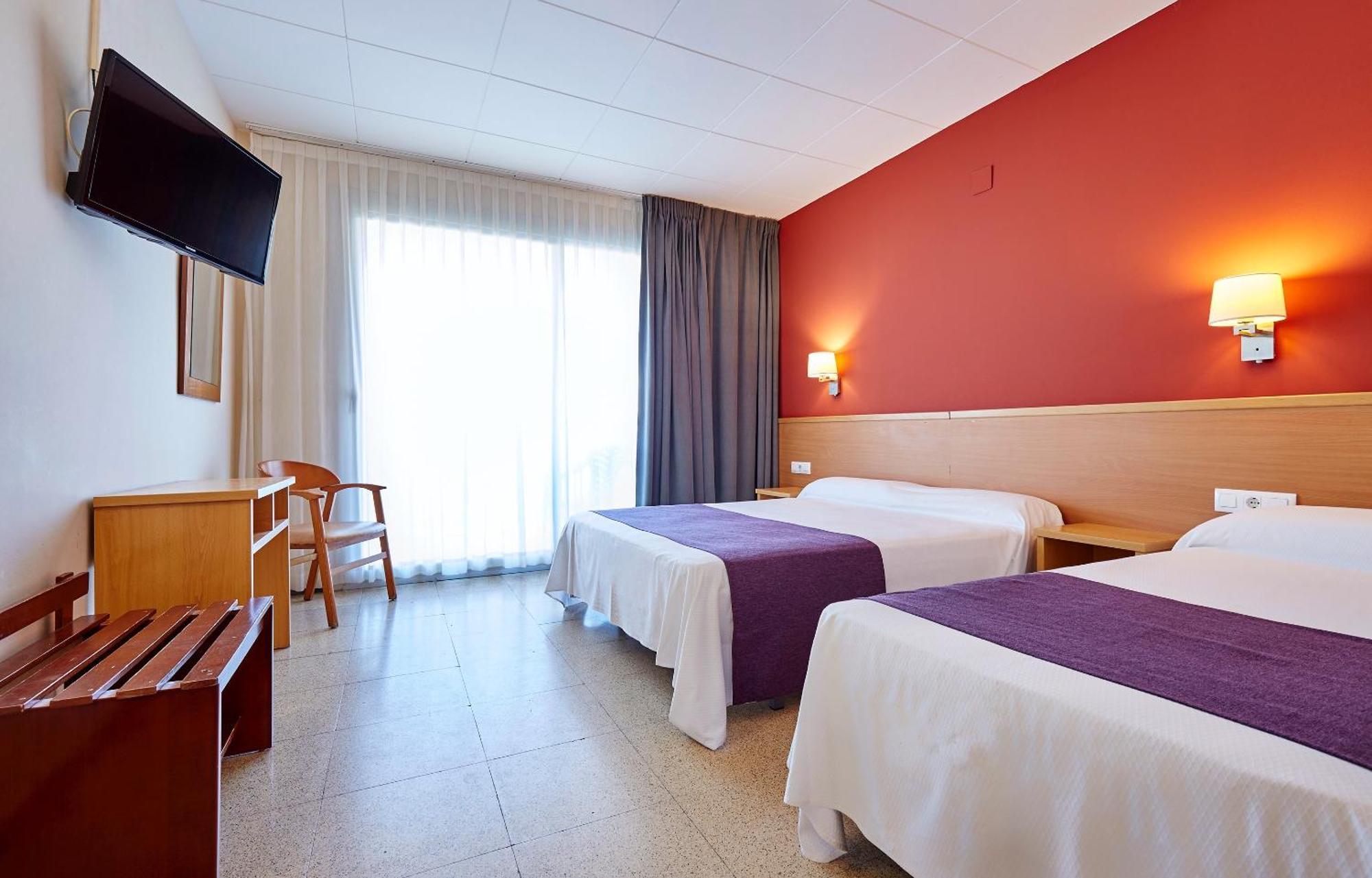 Camera Matrimoniale Economy con Letto Supplementare (2 Adulti + 2 Bambini)